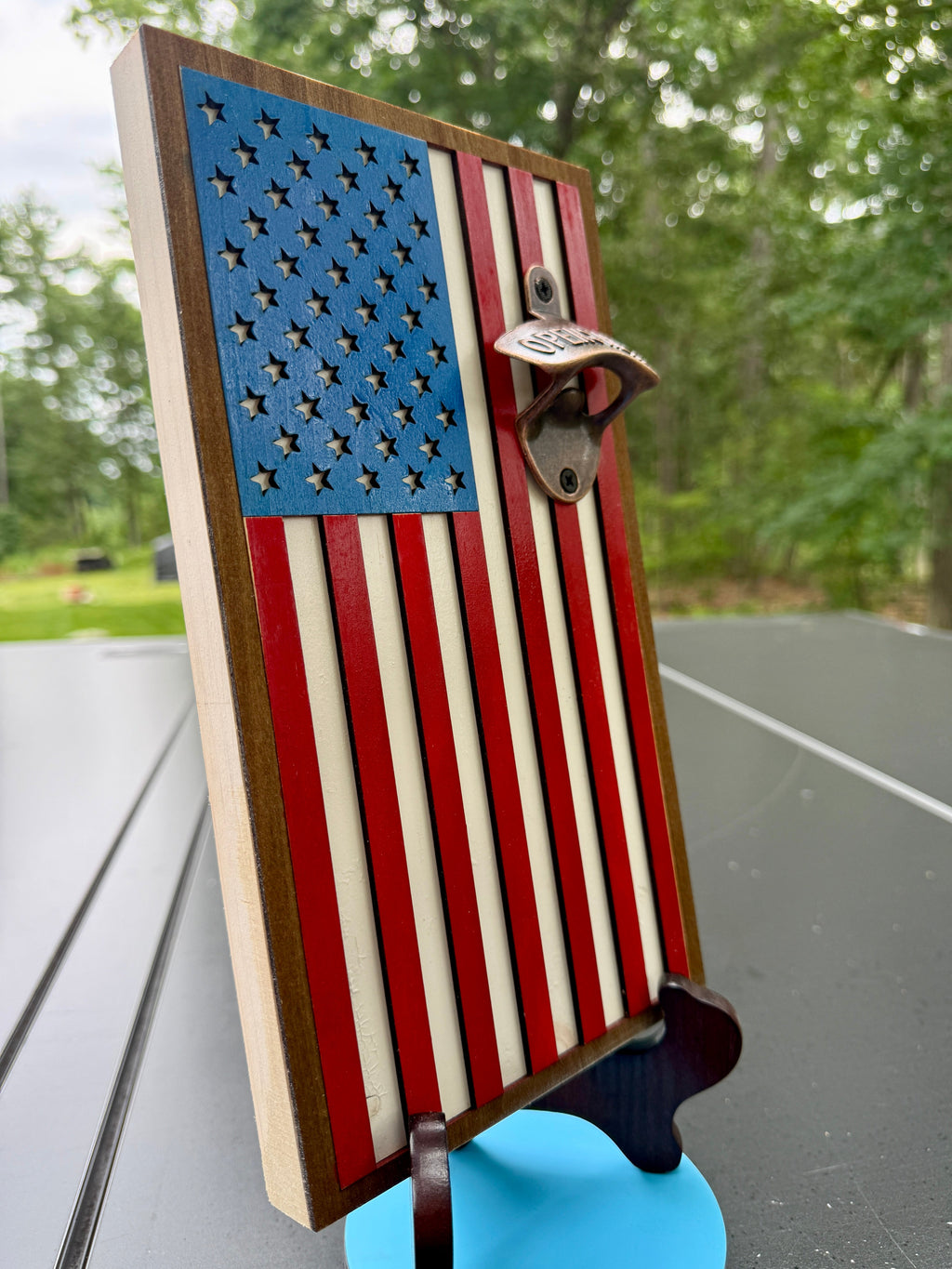 Side angle view of handmade American flag magnetic bottle opener